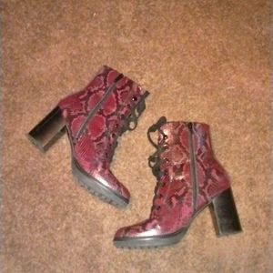 Neutralizer maroon and black fake snakeskin high heeled boots